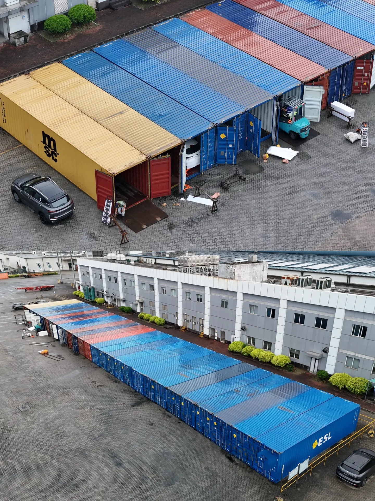 Vehicles being prepared and loaded into export containers